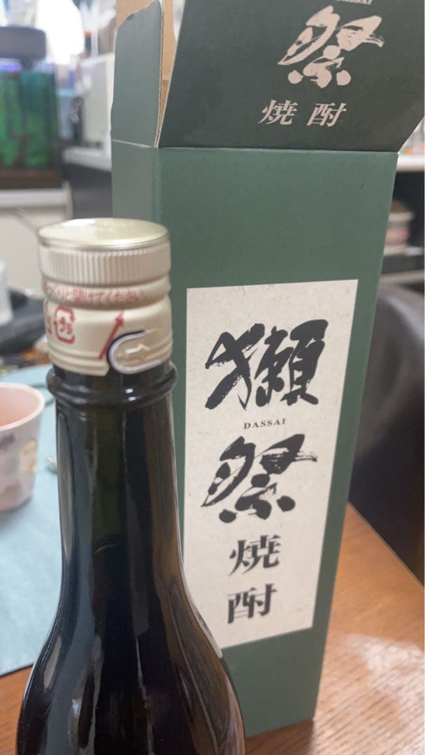 獺祭 焼酎 緑色パッケージ