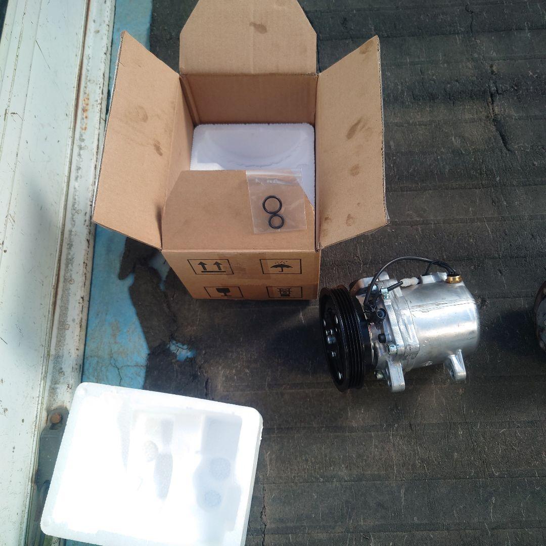 新品リビルトエアコンコンプレッサー キャリイ DA63T DA65T