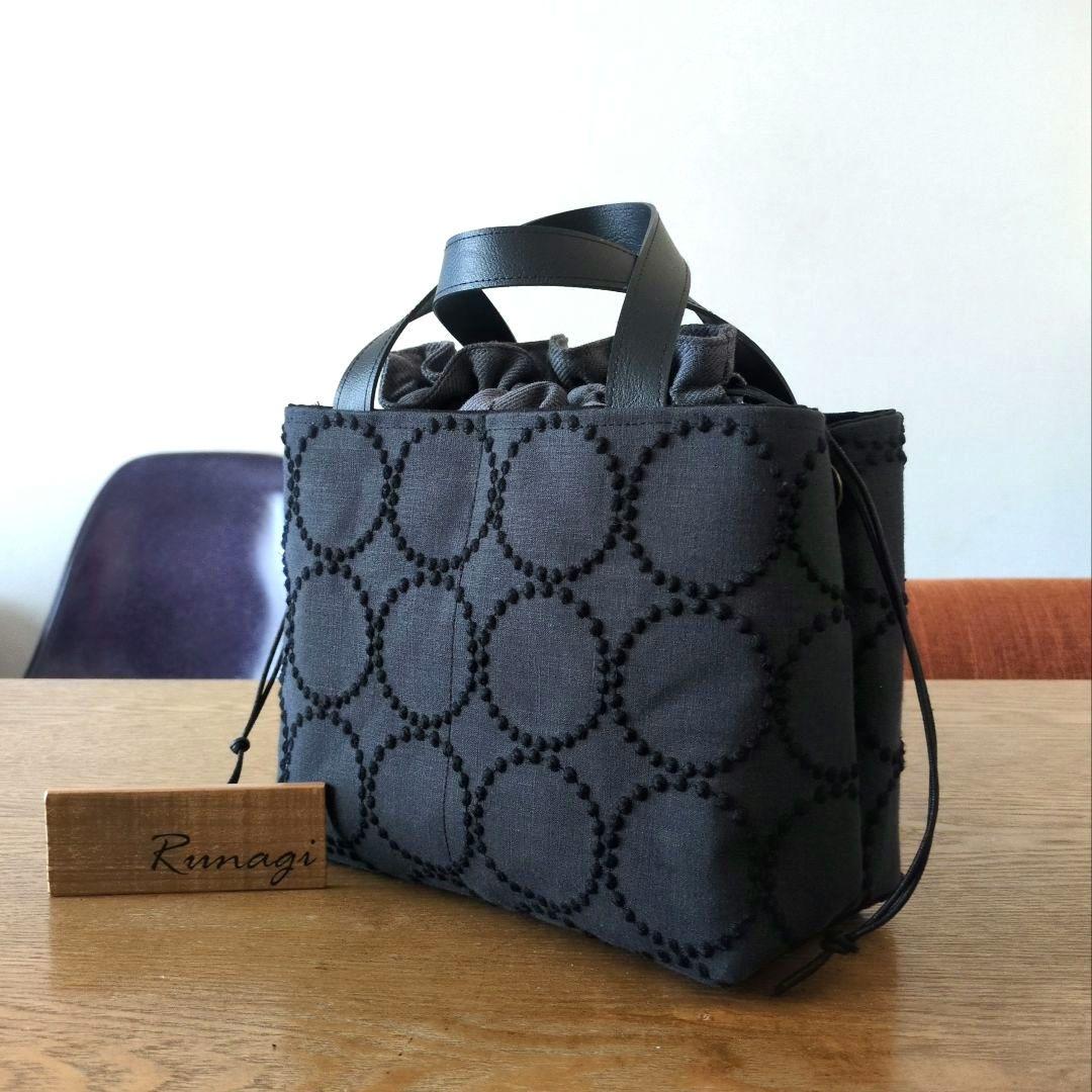 【1566】あおりポケットの巾着バッグ＊ミナペルホネン