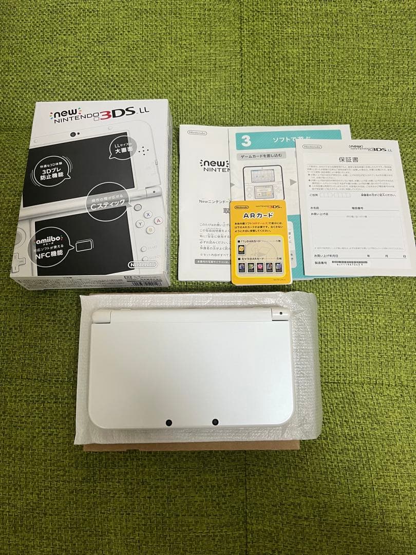 Newニンテンドー3DSLL パールホワイトと、透明外観保護カバー付き
