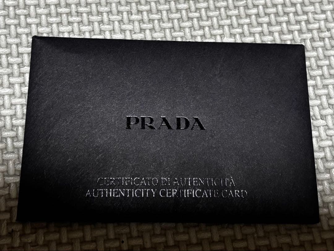 え*ん様 【新年特価】PRADA プラダ 水色 レザー 長財布 ショッパー付き