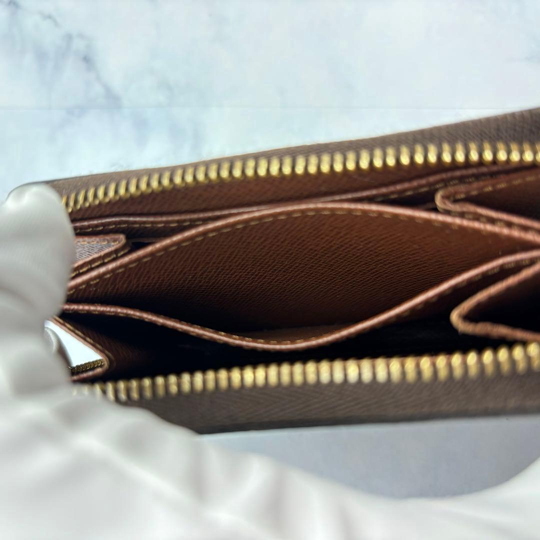 ルイヴィトン ジッピー パース モノグラム ケース