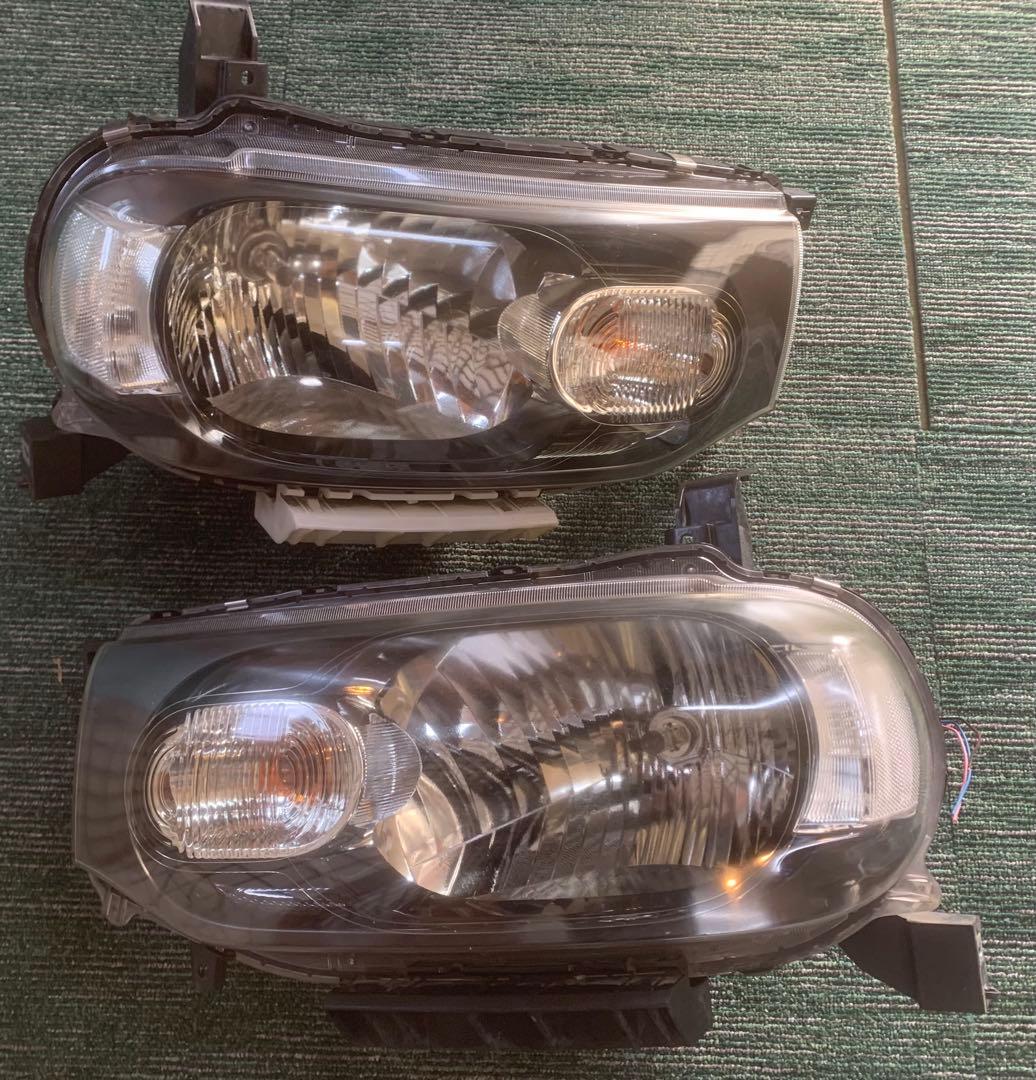 日産 キューブZ12左右ヘッドライト ハロゲンSTANLEY P8190