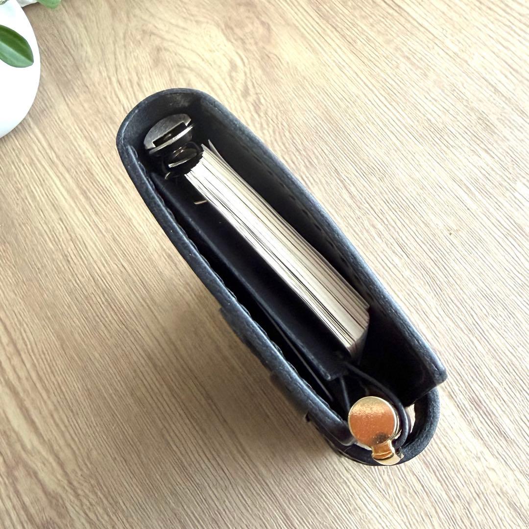 にこにこママページ【ヌメ革】M５システム手帳　ひねり錠　ブラック＆カウ柄