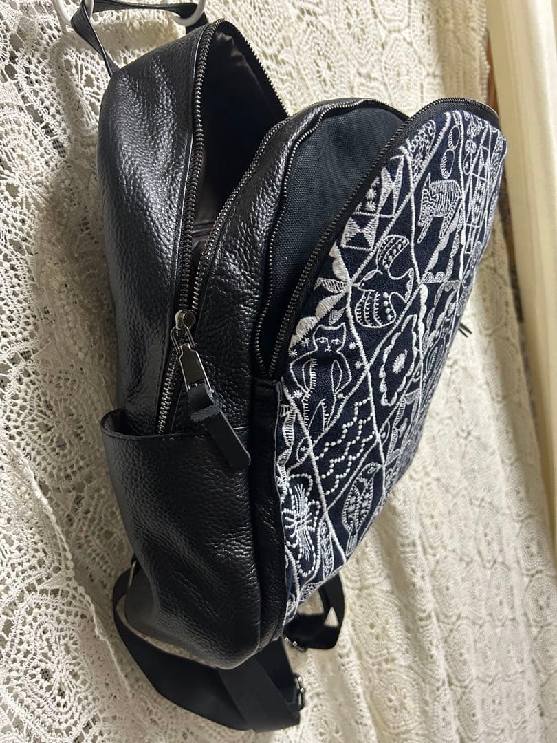 50928A ミナペルホネンハーフハンドメイド本革リュック シンフォニー