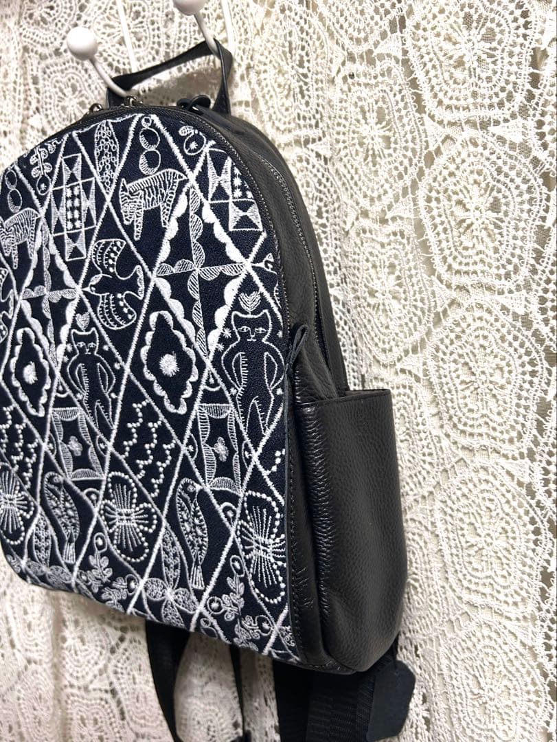 50928A ミナペルホネンハーフハンドメイド本革リュック シンフォニー