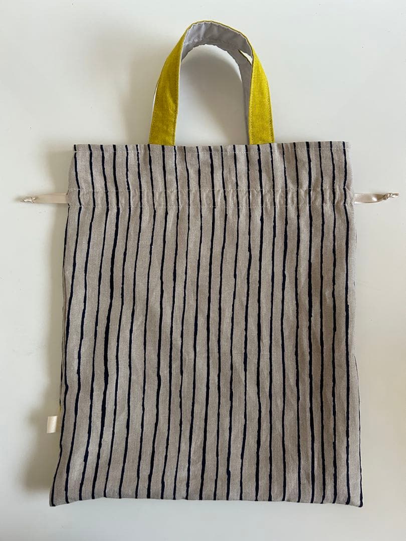 ミナペルホネン生地使用　ハンドメイド巾着バッグ　swing イエロー