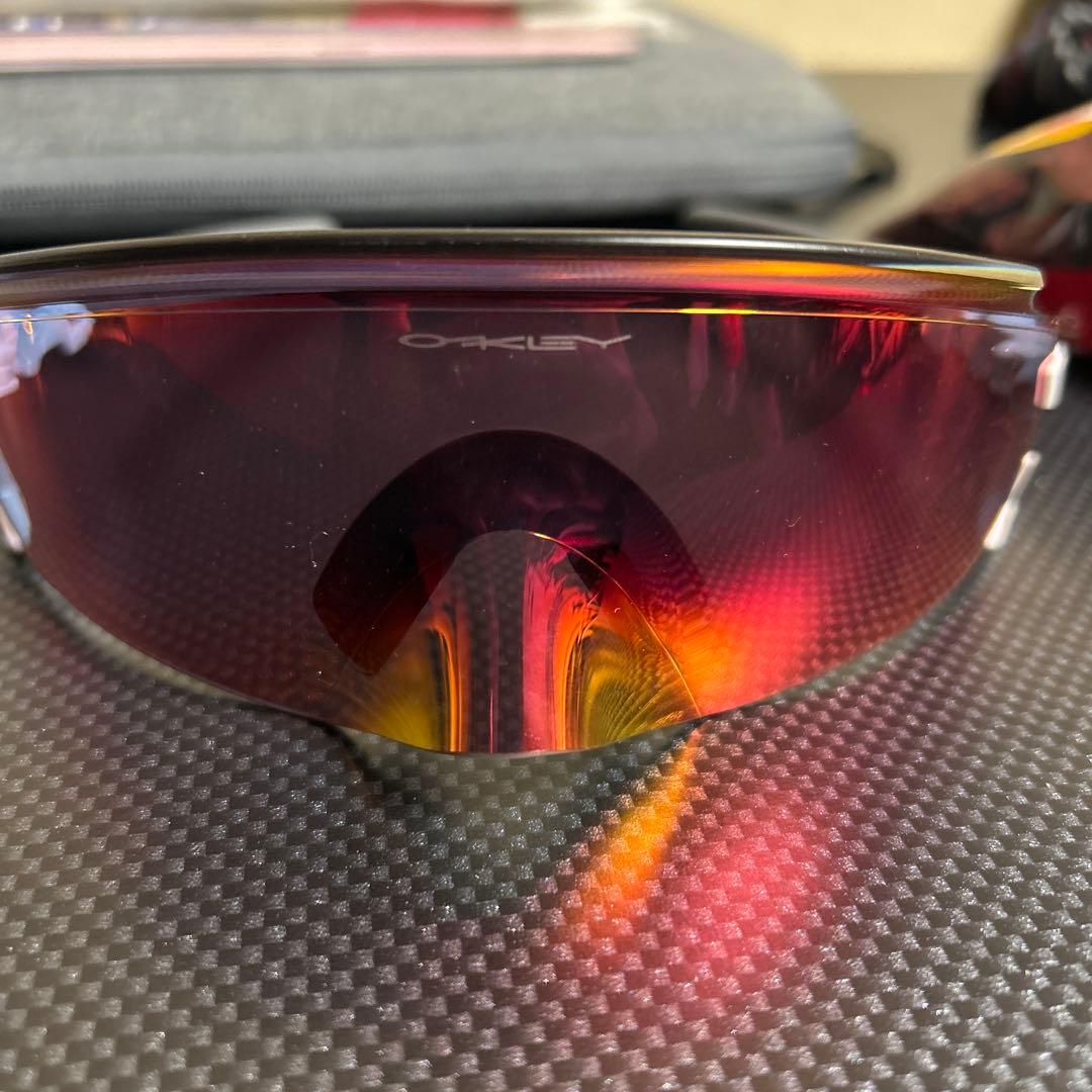 Oakley スポーツサングラス 赤色レンズ
