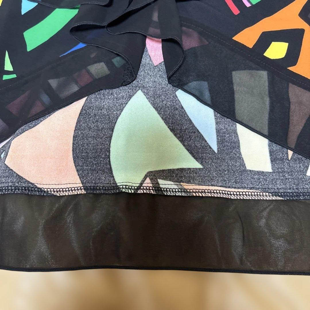 【新品未使用】✨トクコプルミエヴォル✨黒地に前開き陽気なカラフル柄のチュニック❣️