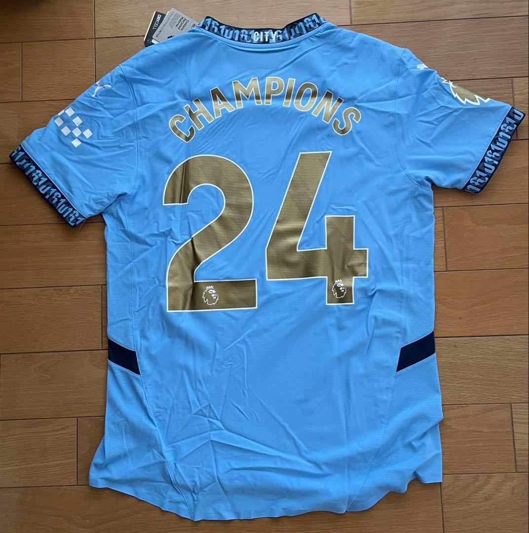 【未使用美品】マンシティ2023-24四連覇優勝記念ウェア　シリアル番号161