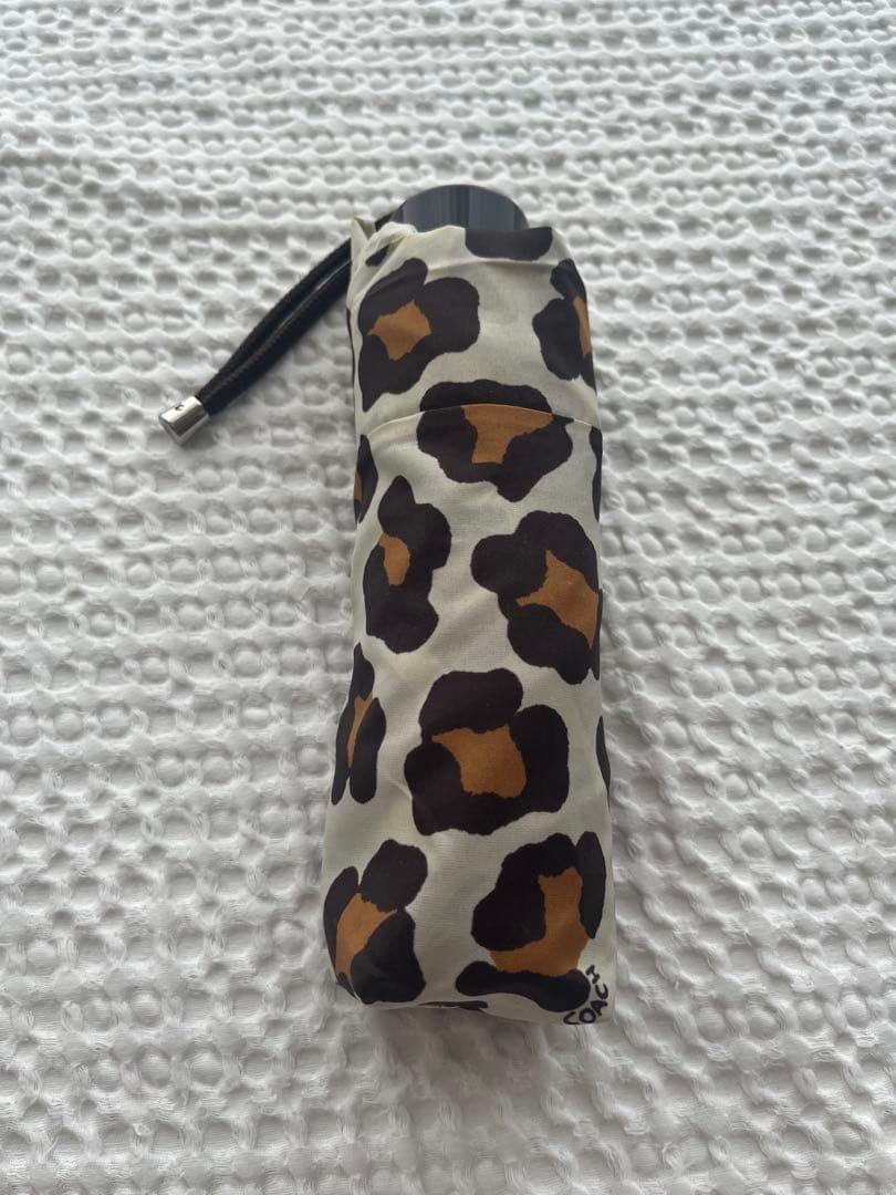 美品COACHコーチ/折りたたみ雨傘/ヒョウ柄