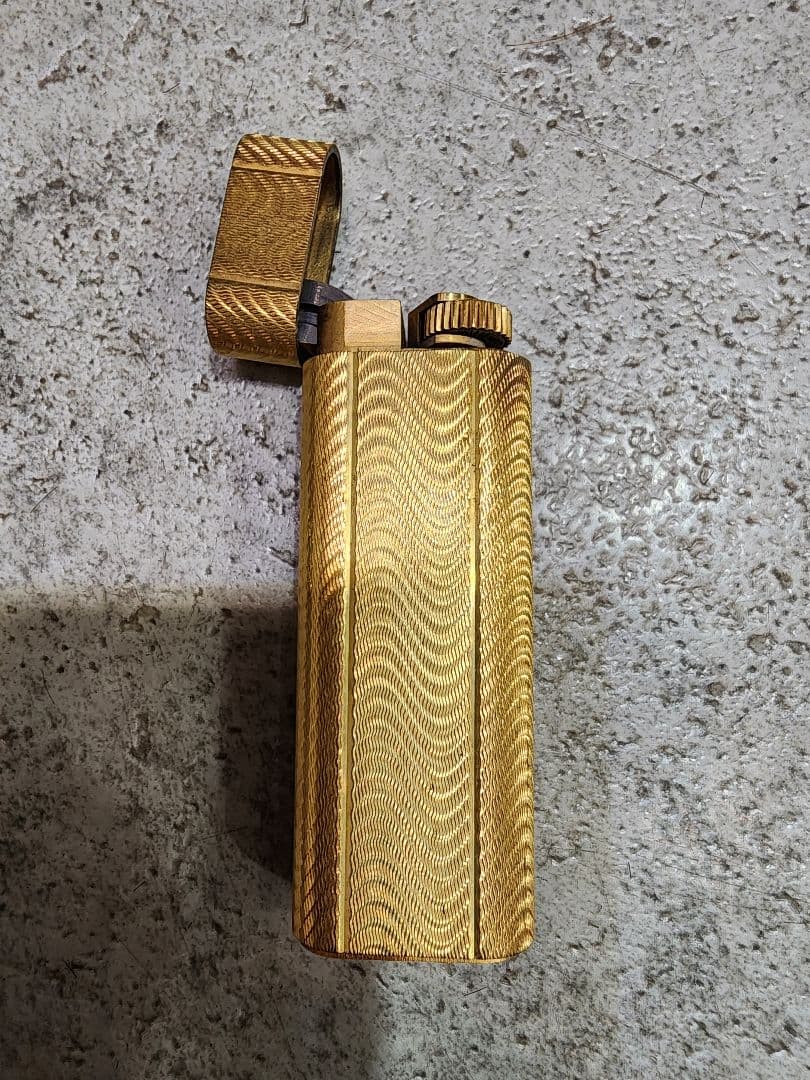 カルティエ ライター ゴールド オーバルストライプ PLAQUE OR