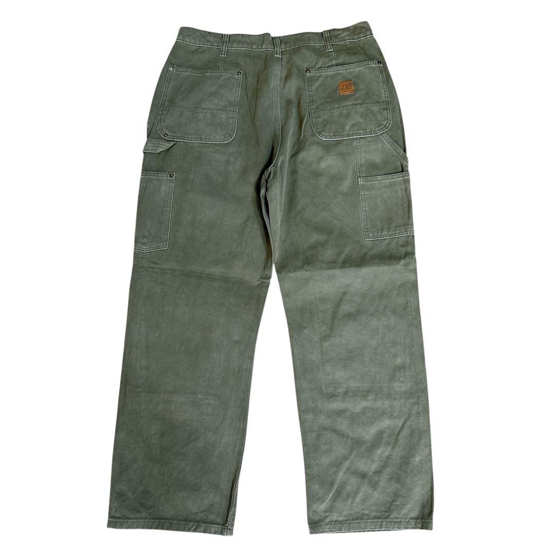 カーハート ワークパンツ w34 オリーブ ロゴ古着 ダブルニー