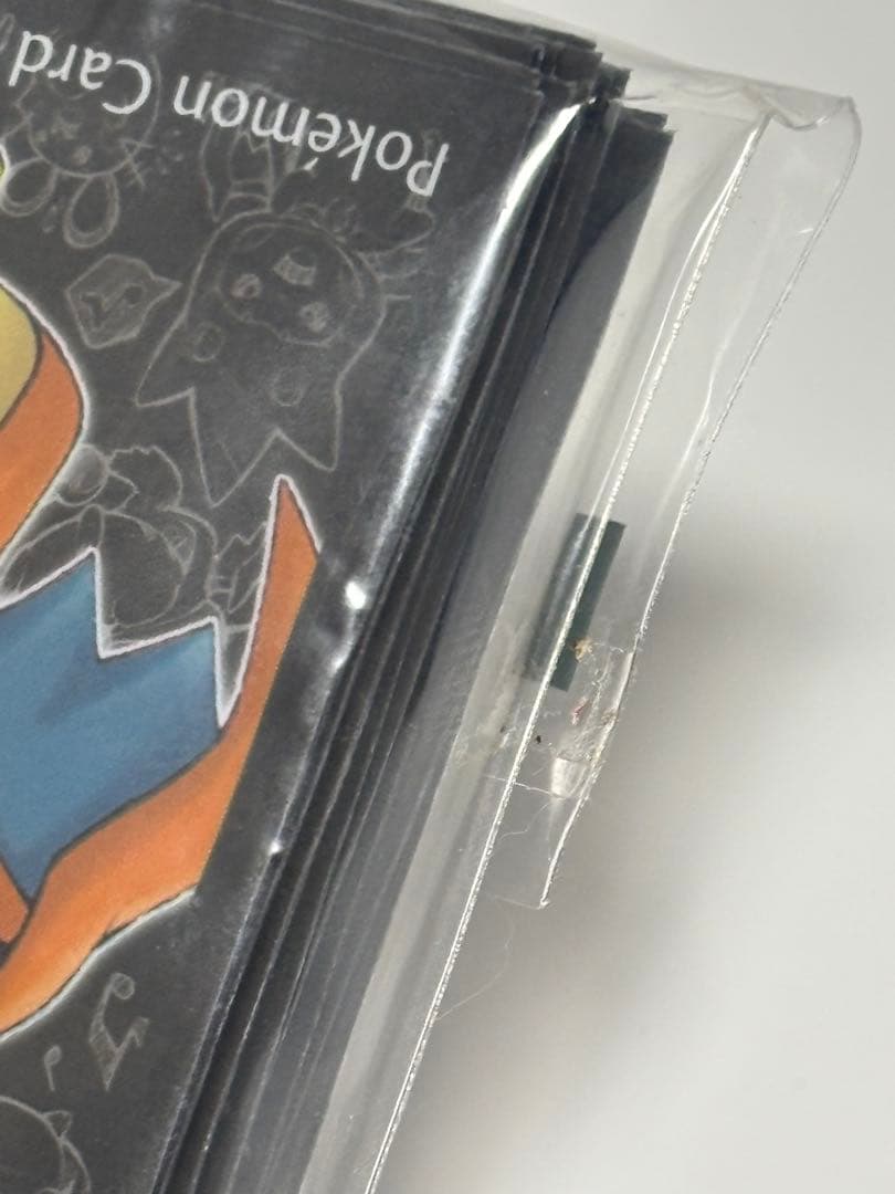 メガリザードンYのポンチョを着たピカチュウ　ポケモンカード　デッキシールド