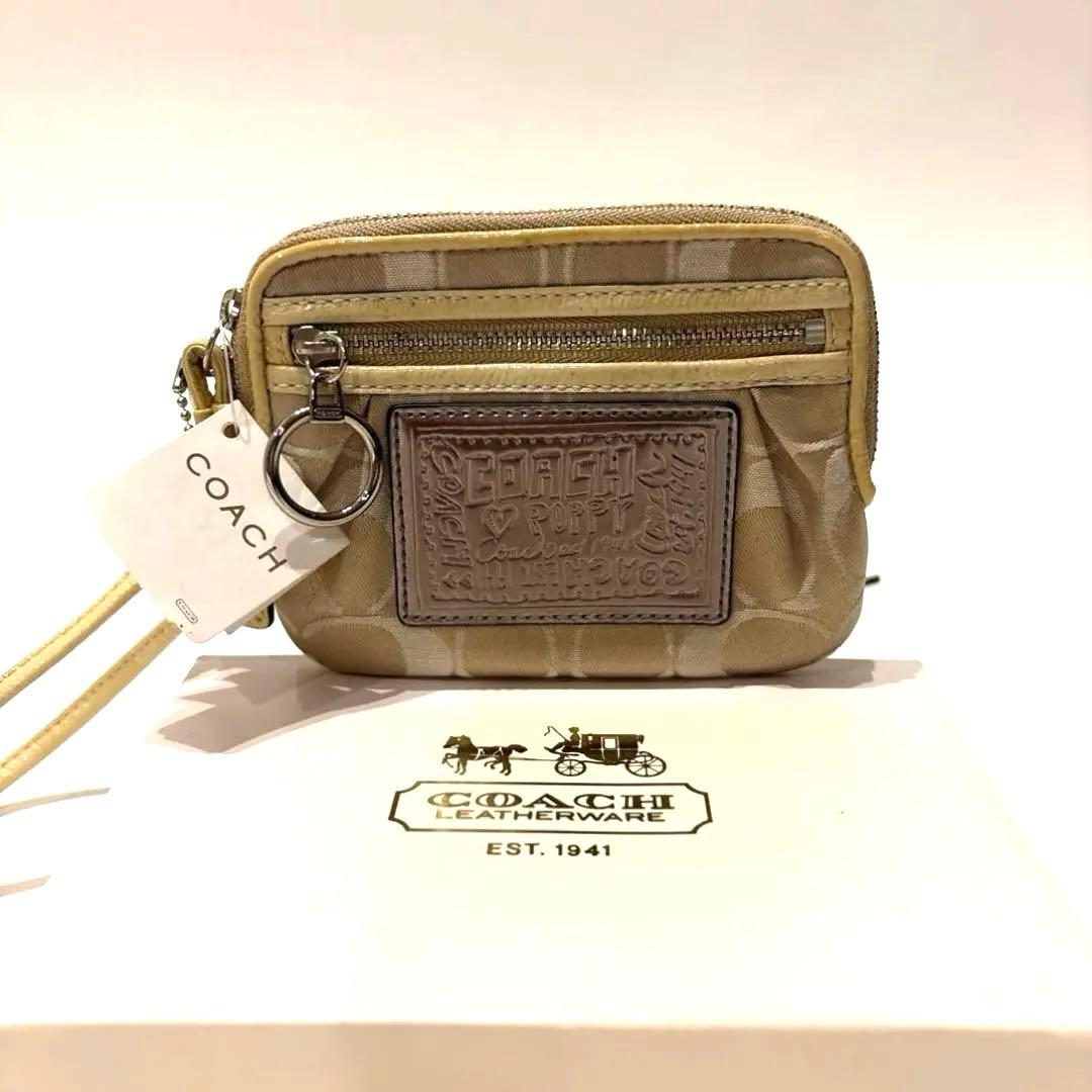 【新品】COACH コーチ シグネチャー柄キャンバス ポピー リストレットポーチ