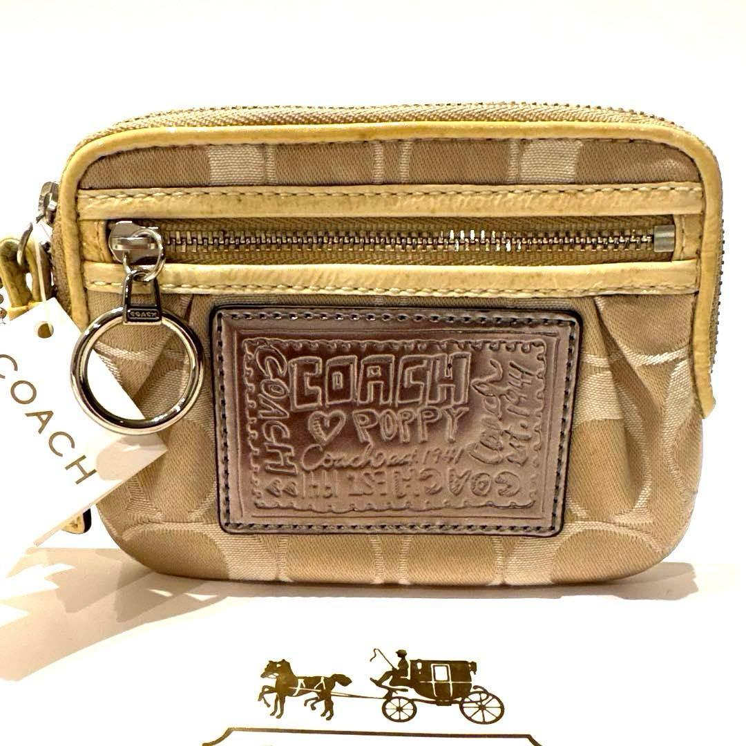 【新品】COACH コーチ シグネチャー柄キャンバス ポピー リストレットポーチ
