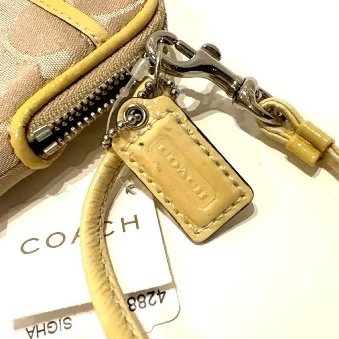 【新品】COACH コーチ シグネチャー柄キャンバス ポピー リストレットポーチ