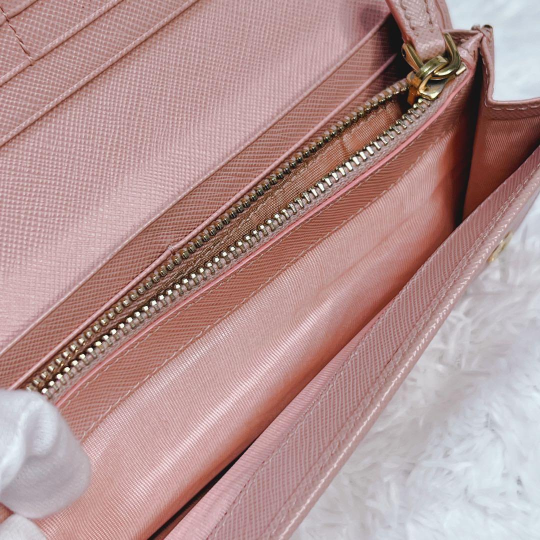 PRADA プラダ　長財布　サフィアーノ　フィオッコ　メタルロゴ　ピンク　リボン