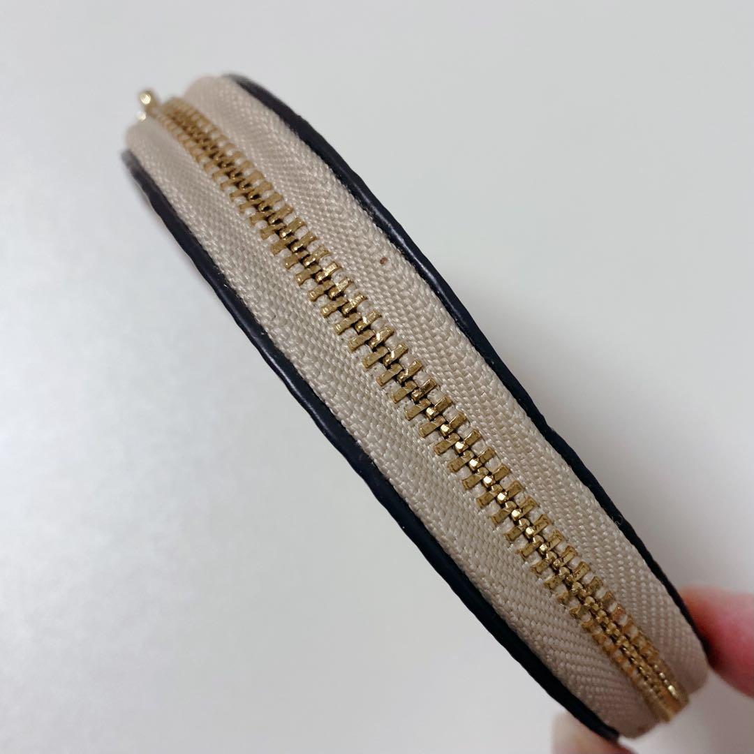 【新品未使用】COACHコーチ★丸型ラウンドケース★花柄フラワー★ベージュ