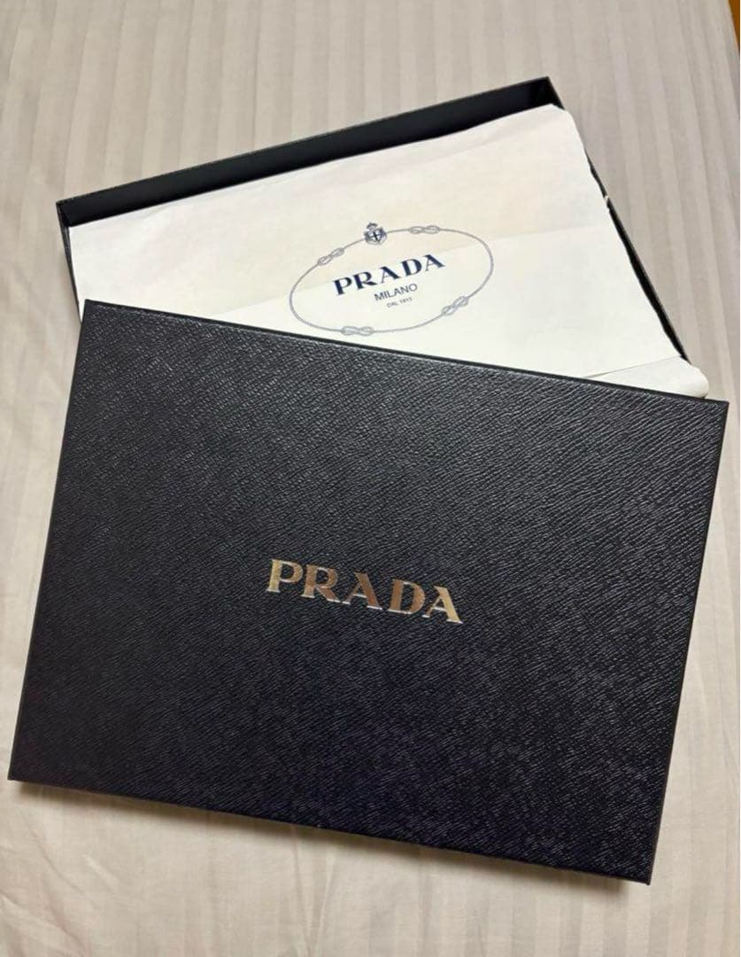 PRADA プラダ トライアングルポーチ バッグ イエロー 男女兼用　新品