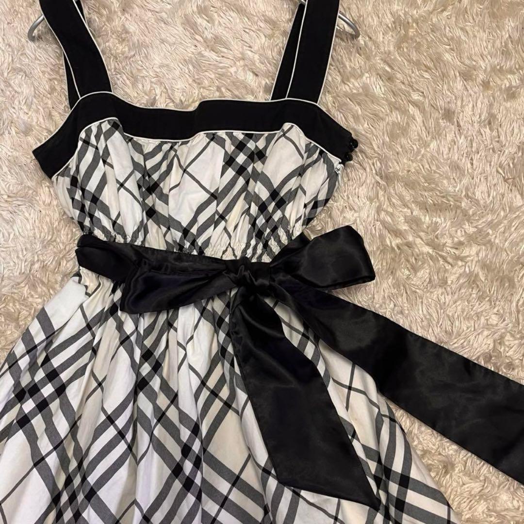 38【バーバリーブルーレーベル】ウエストリボンフレアワンピース 白黒チェック総柄