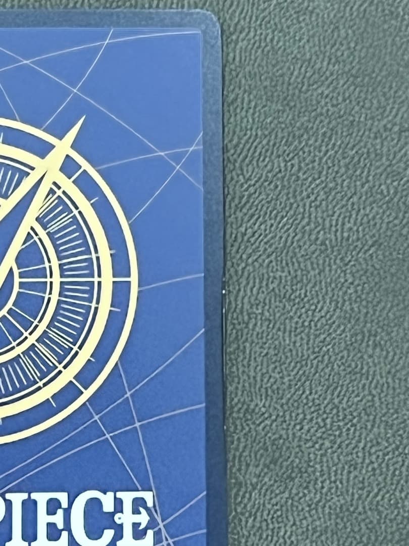 ワンピースカード 新たなる皇帝【マーシャル・D・ティーチ ★コミパラ】※傷あり