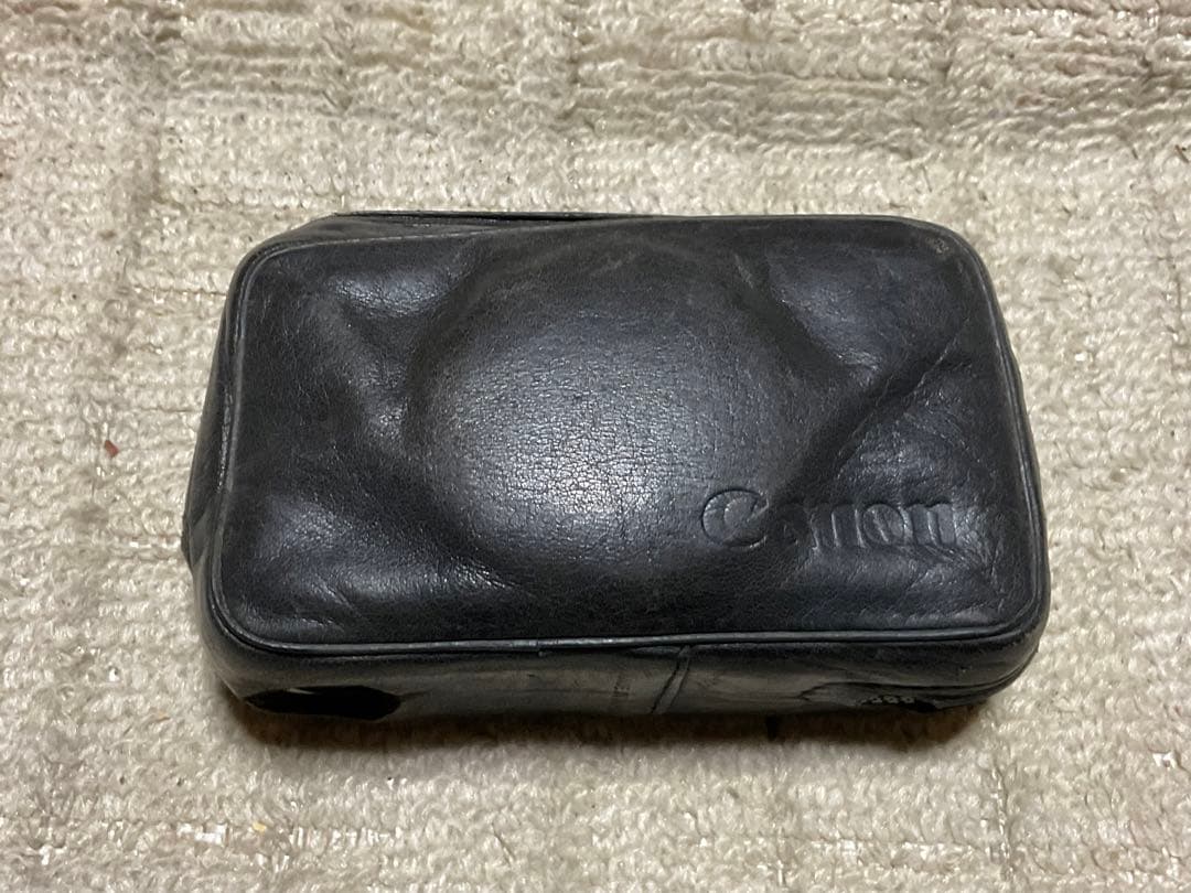 Canon／小型フイルムカメラ。【外部錆あります。内部多少汚れがございます】