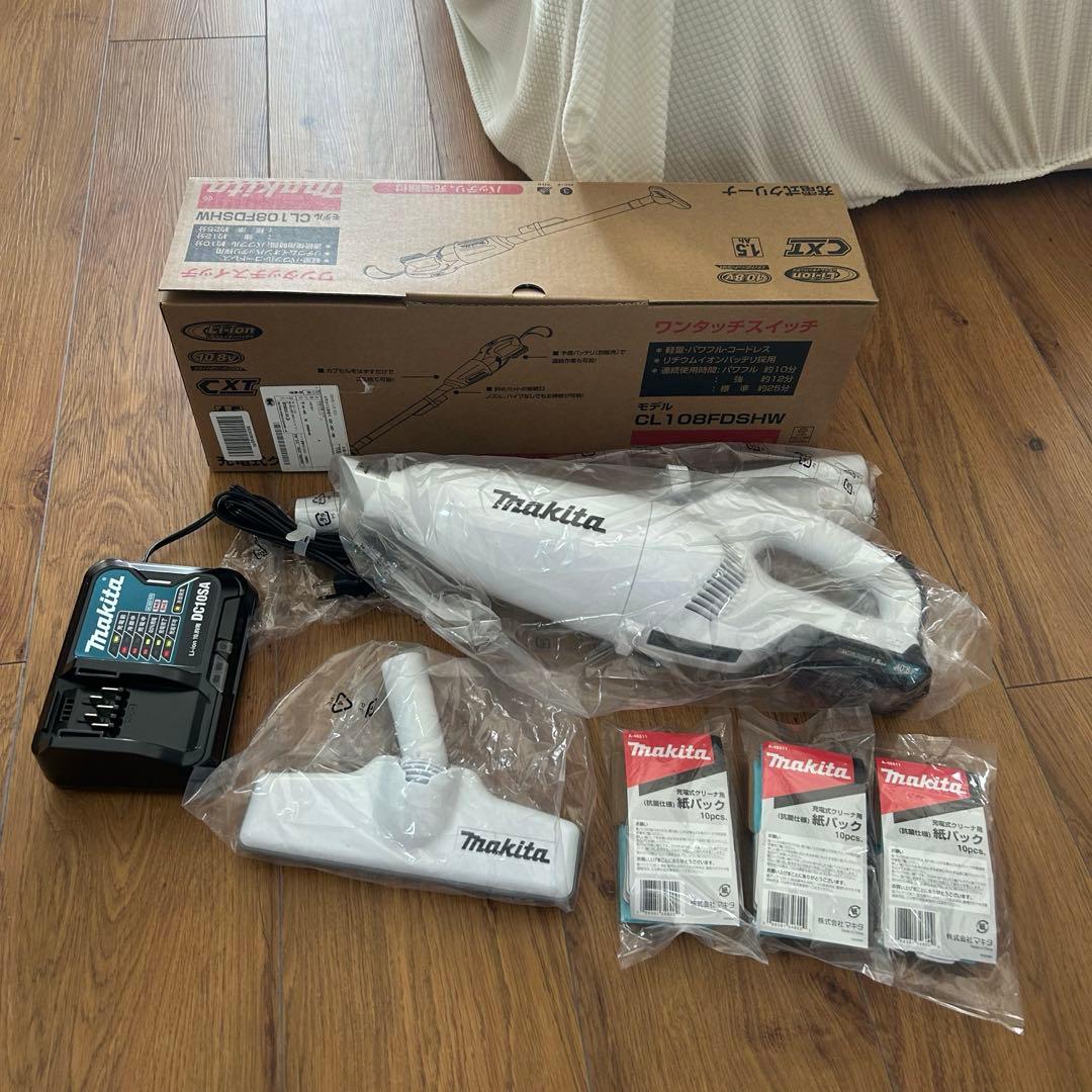 【美品】コードレス掃除機 カプセル式 軽量モデル 充電器，紙パック30枚付き