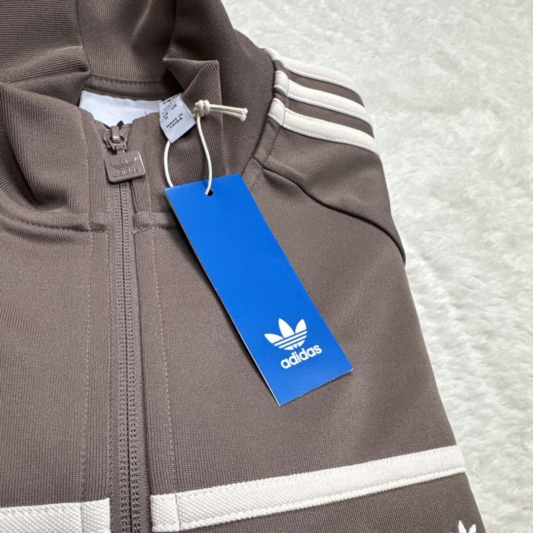 タグ付き【未使用品】販路限定 FIRST TRACKファースト トラック トップ