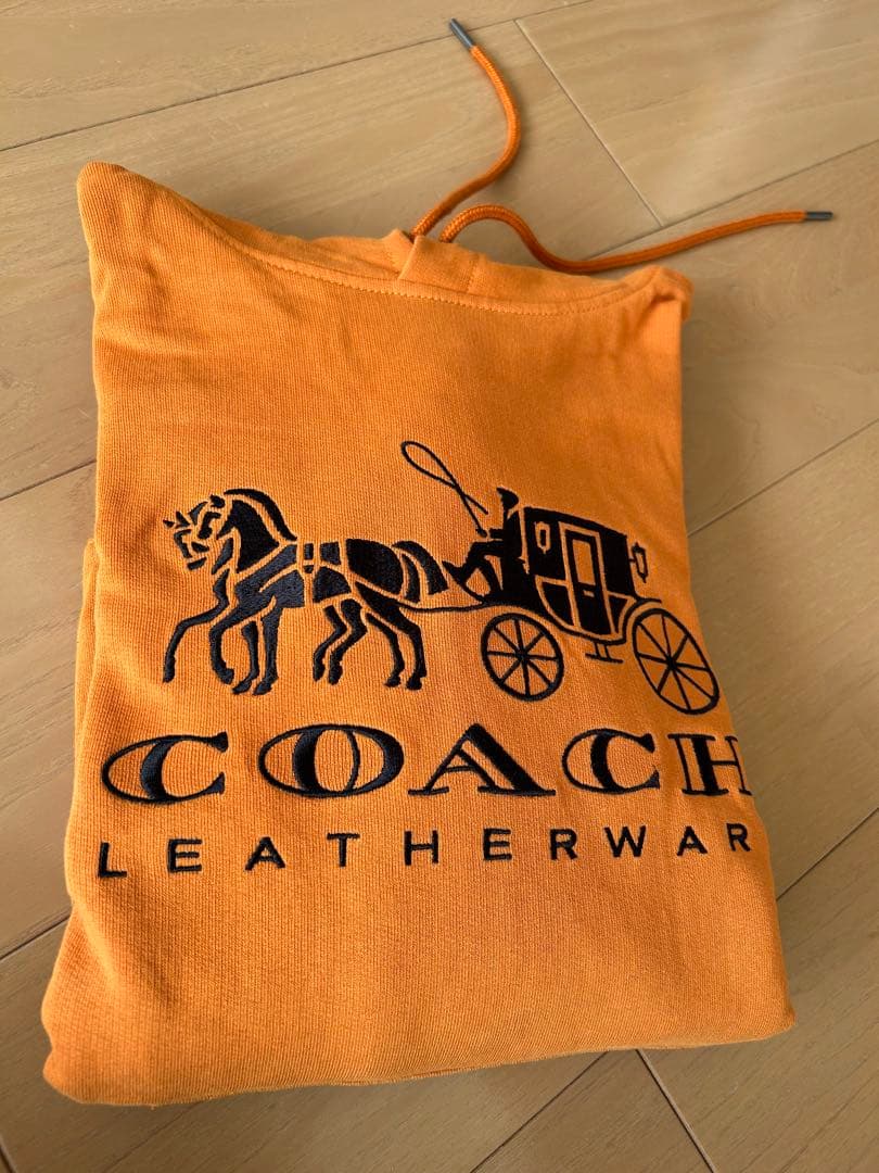 COACH オレンジ パーカー