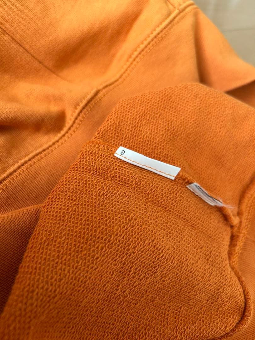 COACH オレンジ パーカー