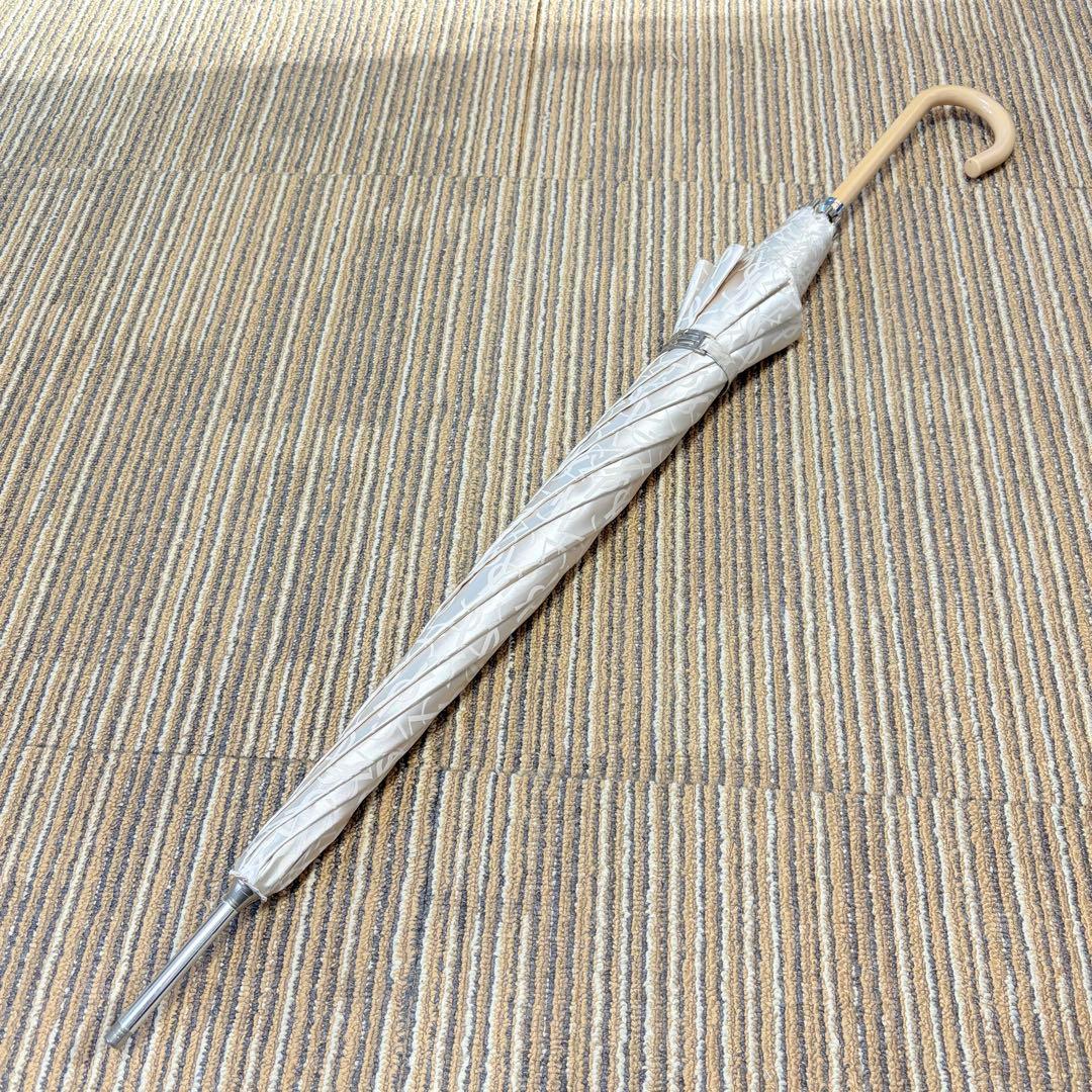 イヴ・サンローラン　YSLロゴ総柄晴雨兼用長傘　メタリックホワイト