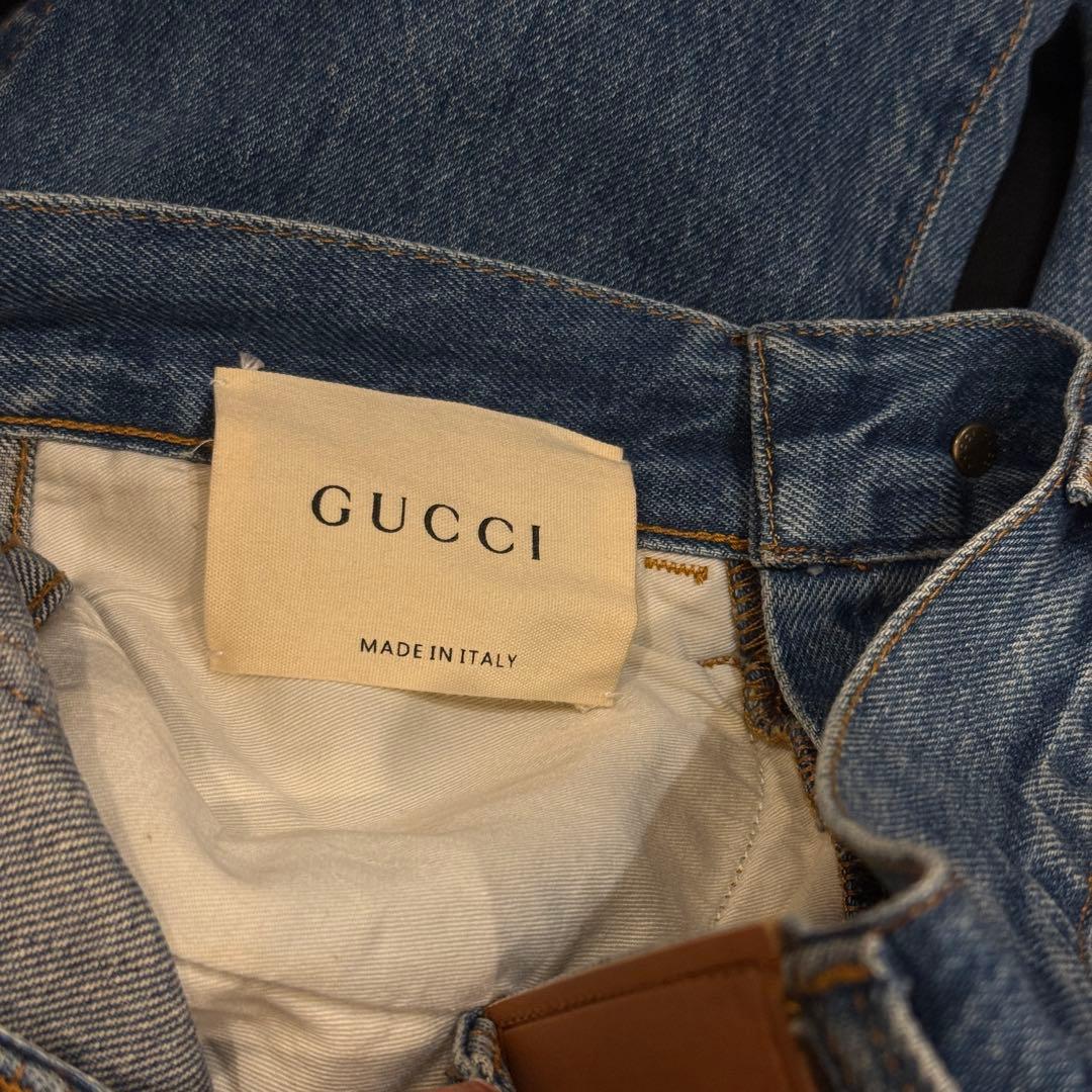 GUCCI NYロゴ刺繍デニムパンツ