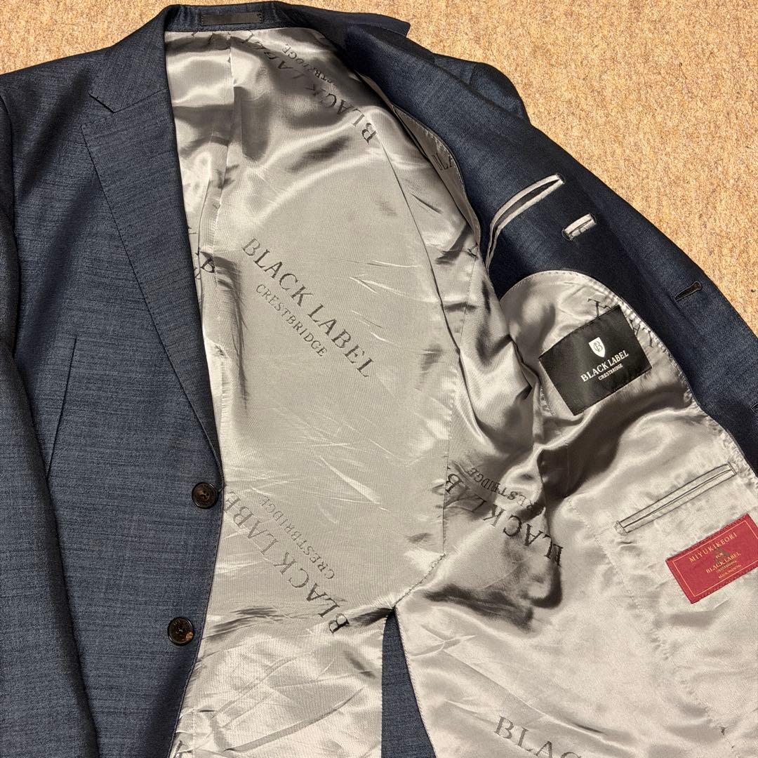 ブラックレーベル 人気サイズM相当 38L ネイビー スーツ 御幸毛織
