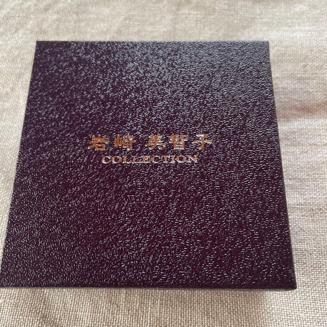 岩崎美智子コレクション　シルバーロッククリスタルクォーツウェーブバングル