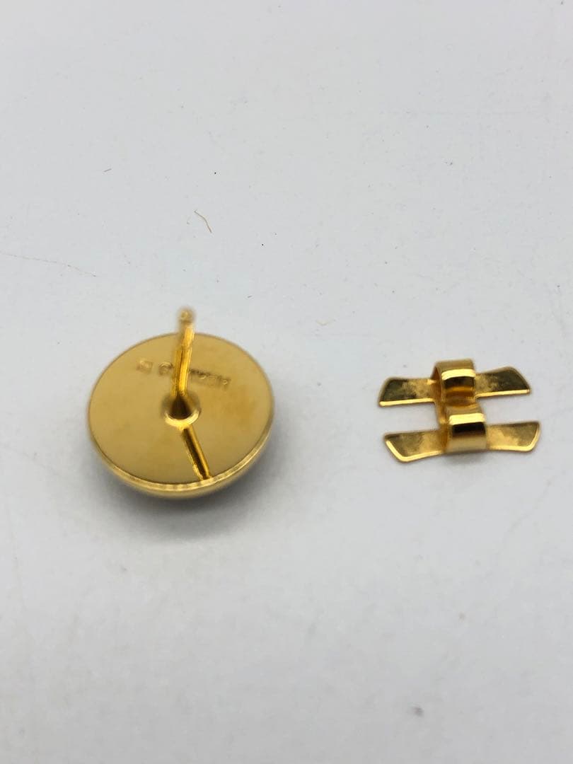 HERMÈS エルメス　グレー スタッドピアス　レディース　金属製　高級感