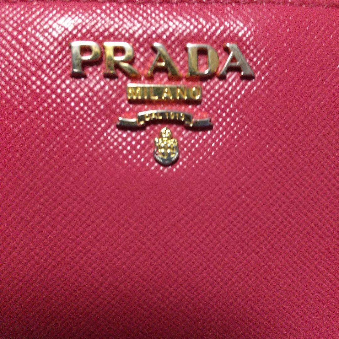 PRADAサフィアーノラウンドファスナー 長財布ピンク系