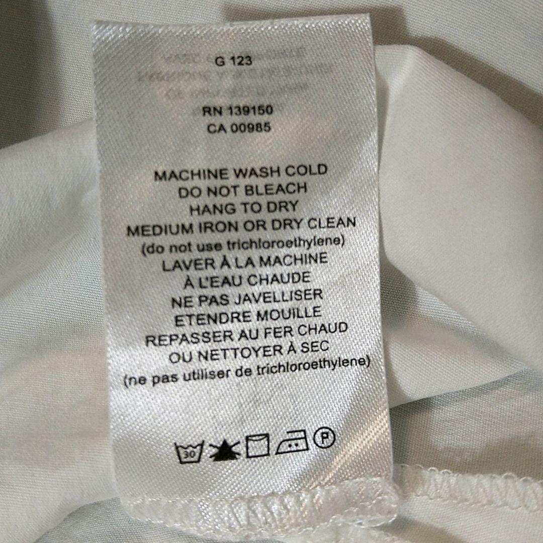 ホワイト ノースリーブ チュニック ツイストデザイン