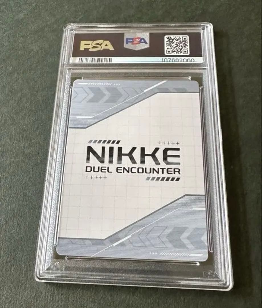 NIKKE DUEL ENCOUNTER ラピ 箔押しサイン入プロモ PSA10