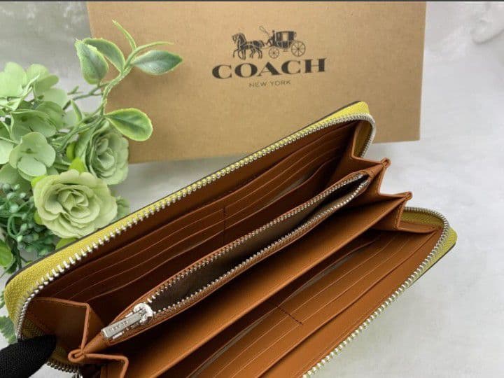 新品未使用コーチ長財布イエローシグネチャーレディースメンズ送料無料即日発送