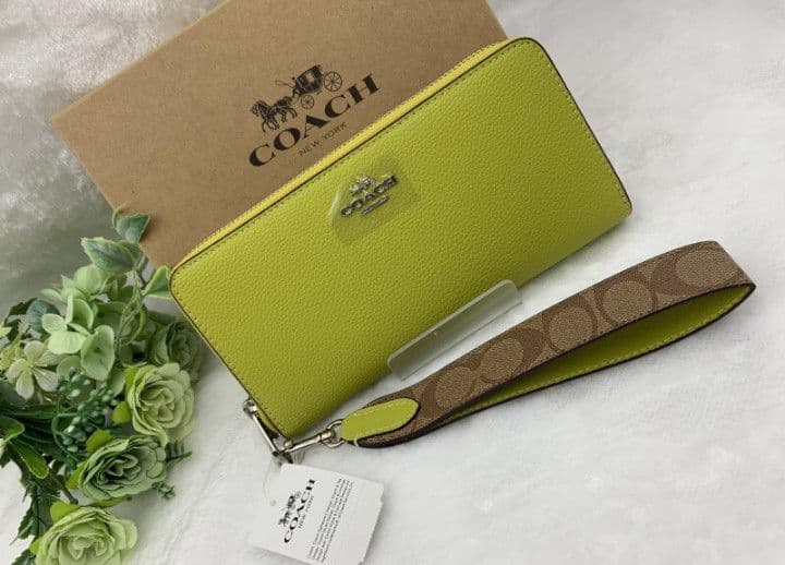 新品未使用コーチ長財布イエローシグネチャーレディースメンズ送料無料即日発送