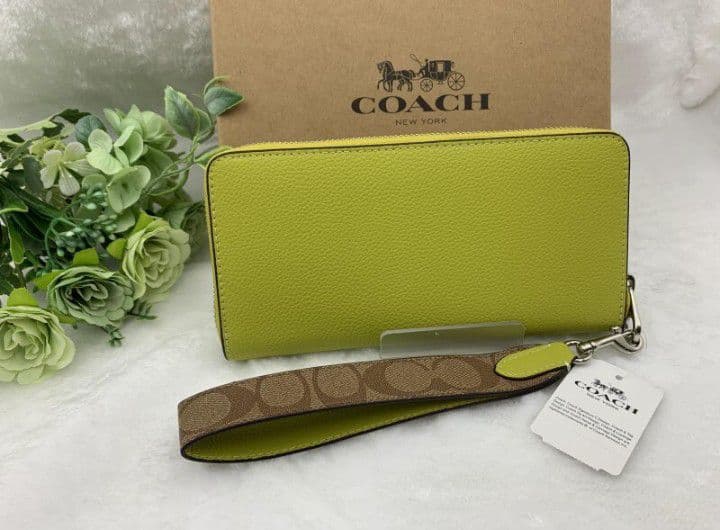 新品未使用コーチ長財布イエローシグネチャーレディースメンズ送料無料即日発送