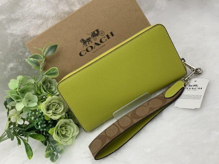 新品未使用コーチ長財布イエローシグネチャーレディースメンズ送料無料即日発送
