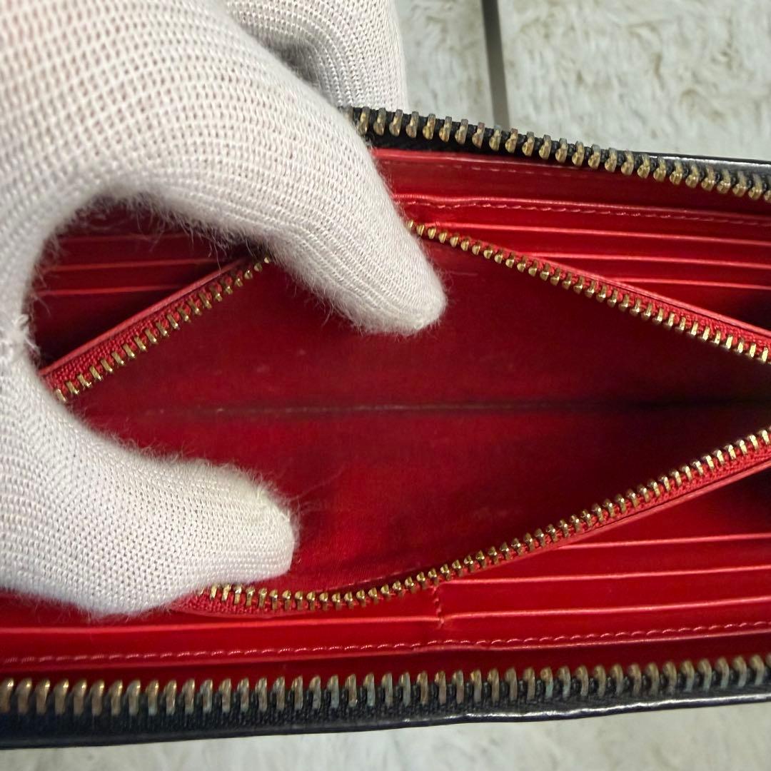 クリスチャンルブタンパネトーネ グラデーションスタッズ ラウンドジップ長財布