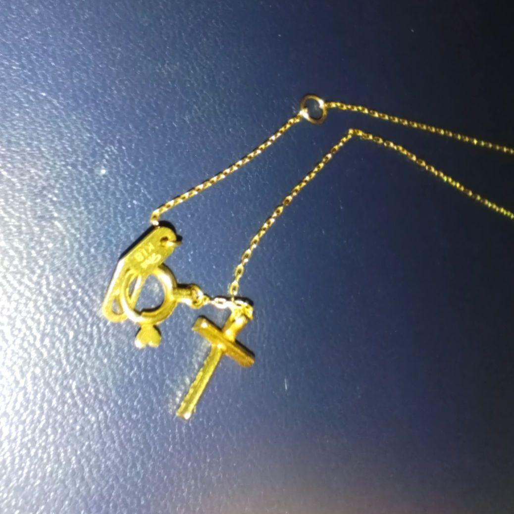 スタージュエリーK18 ダイヤクロスネックレス　マイクロセッティング0.05ct