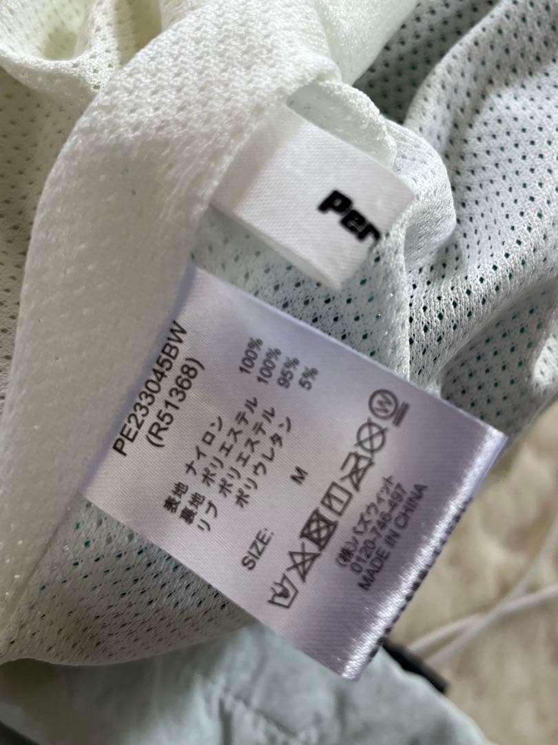 Perushu × NFL コラボナイロンスタンドネックアノラックブルゾン