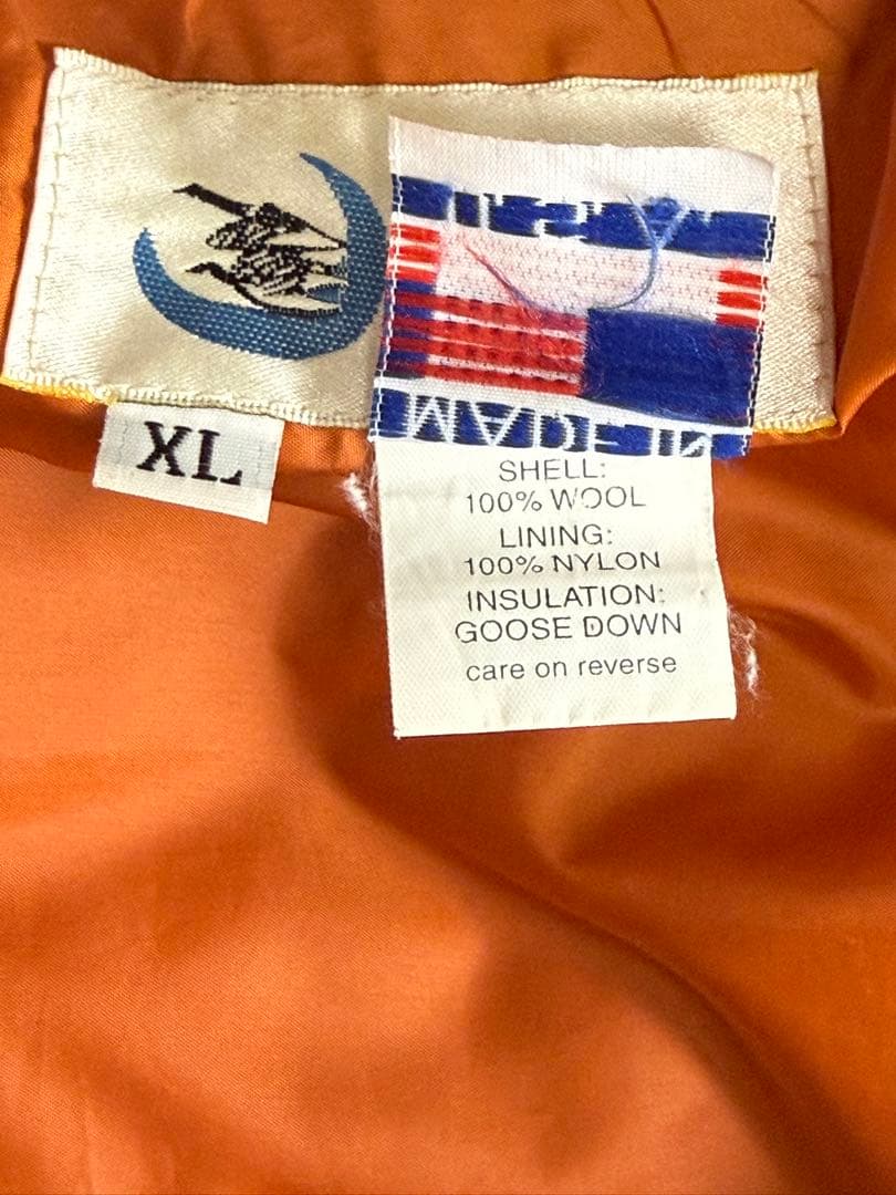 クレセントダウンワークス　フーデッドダウンベスト