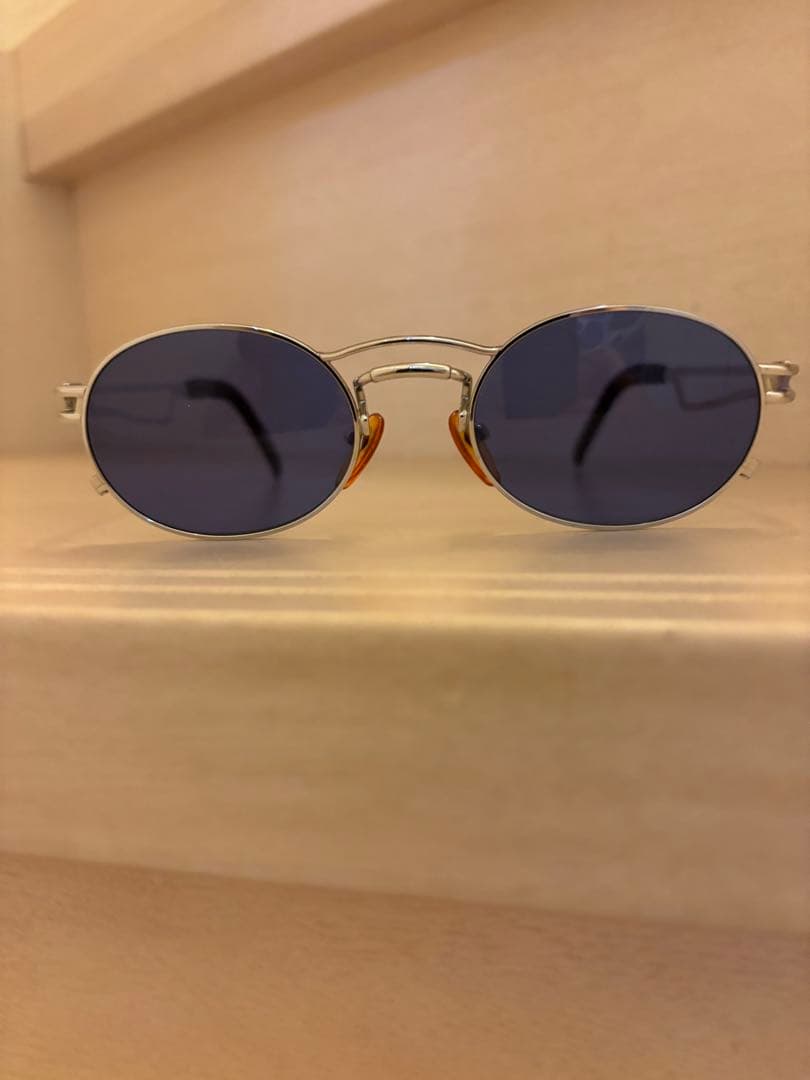 シルバーオーバル型ブルーレンズサングラスジャンポールゴルチェ56-3173