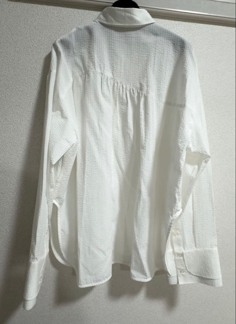 トップス UND UNEVENNESS TIE BLOUSE