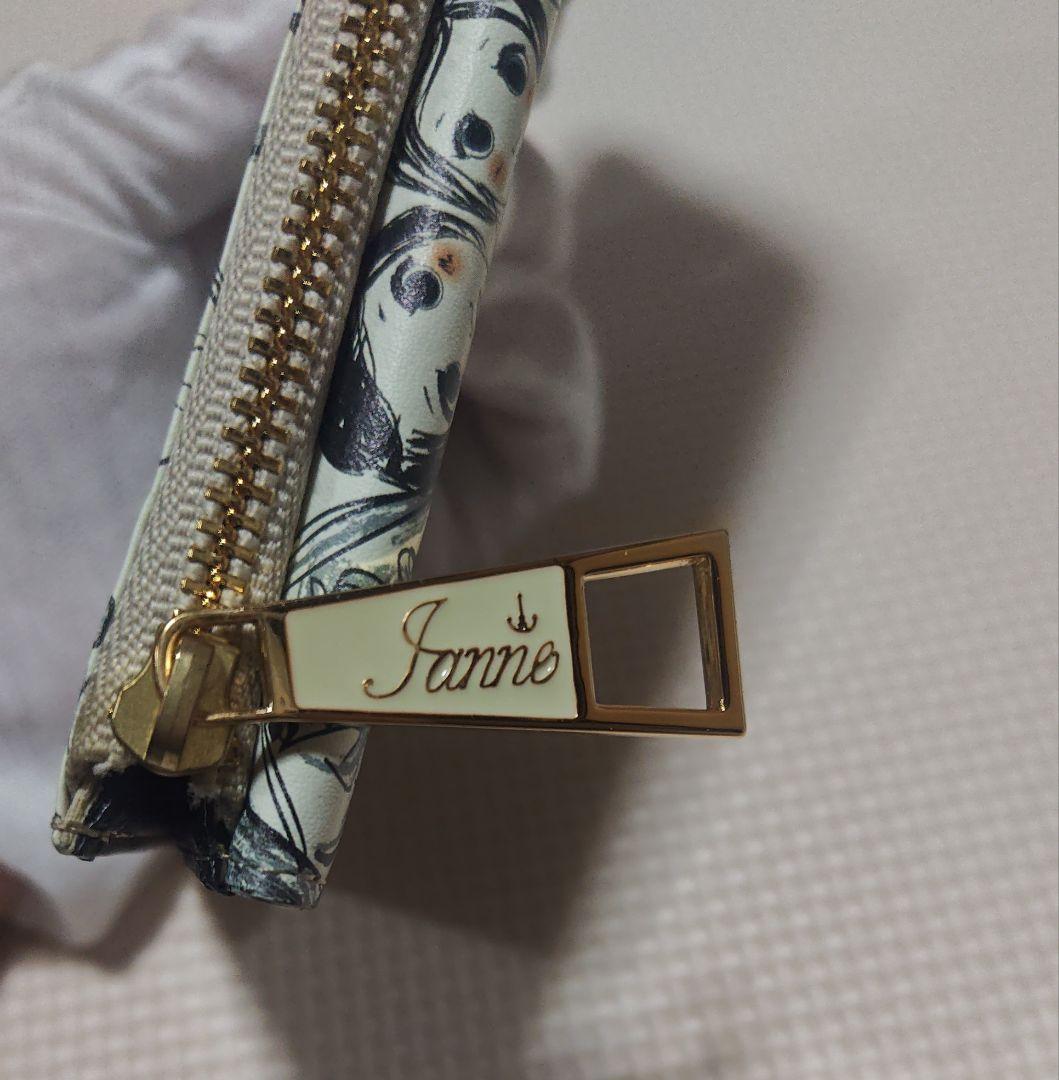 美品・IANNE（イアンヌ）フラグメントケースのような長財布 フェイス柄